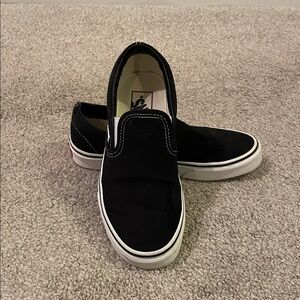 Vans Black and White Women's Slip-On Sneakers